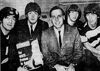 Los Beatles con Larry Kane, durante la gira de 1965